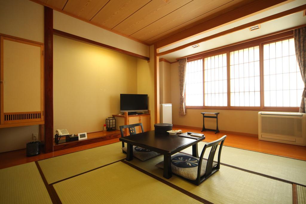 Hôtel Okaerinasai à Iwanai Chambre photo