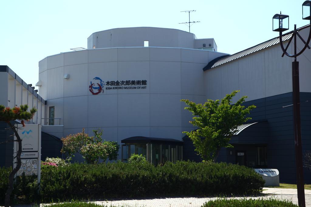 Hôtel Okaerinasai à Iwanai Extérieur photo